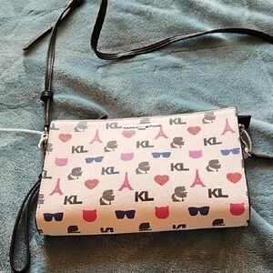 Black and Red Crossbody Bag with Flap Closure